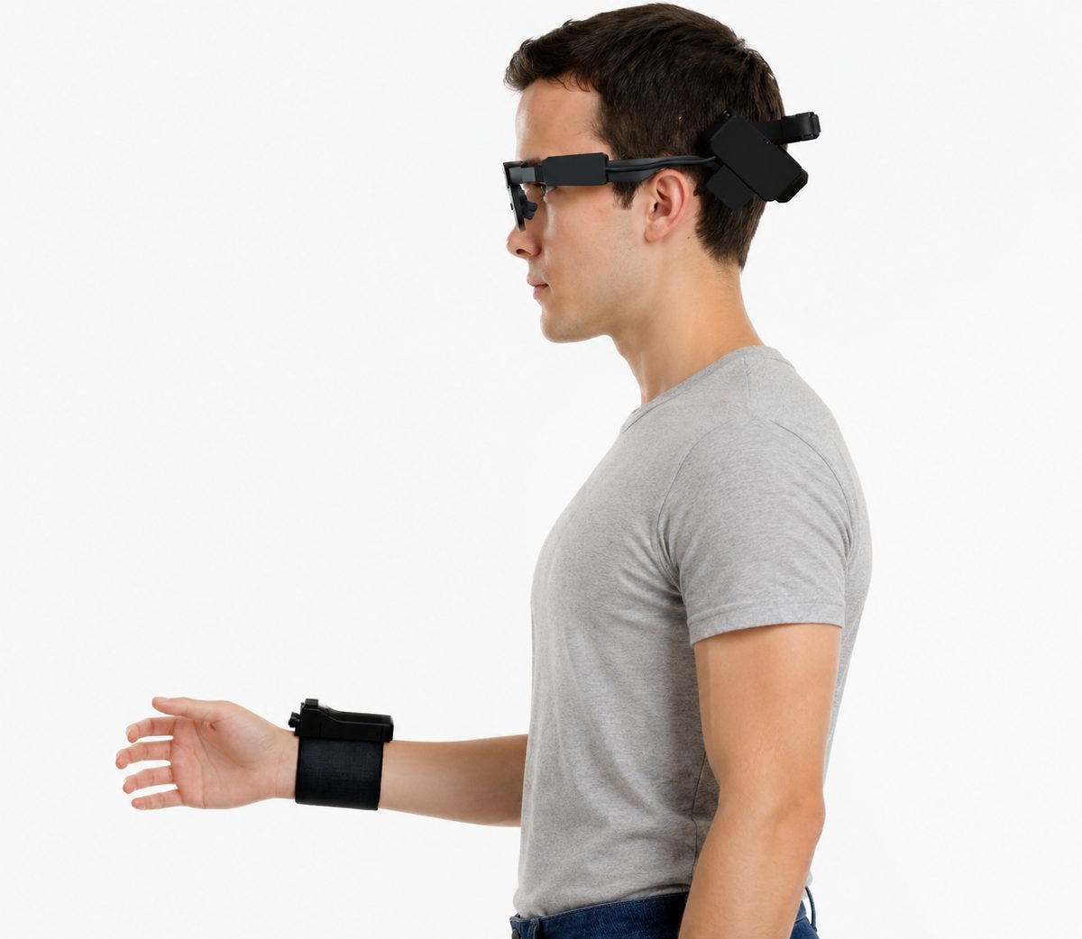 Worker wearing MIRAGE smart glasses and the wrist camera unit